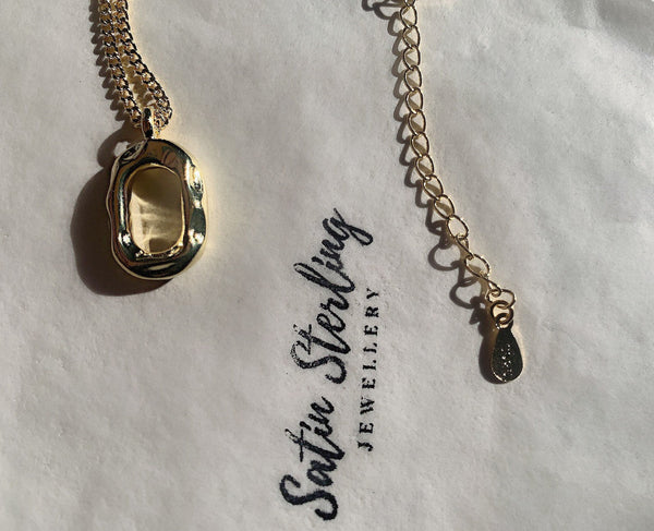 Gold Oval Pendant Necklace