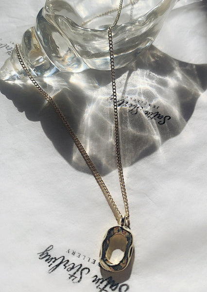 Gold Oval Pendant Necklace
